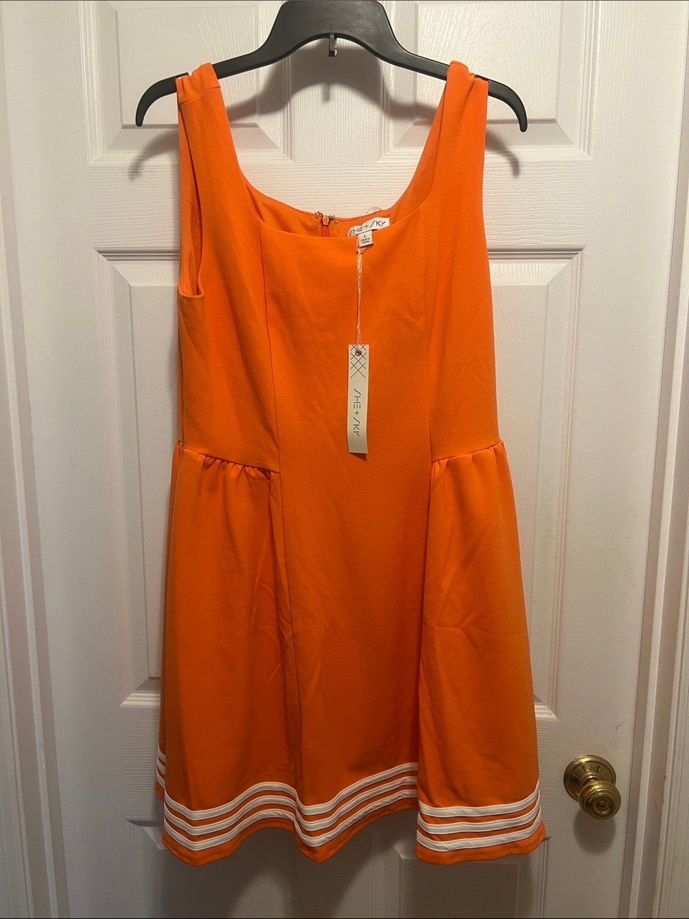 Bright Orange Sleeveless Dress with White Trim